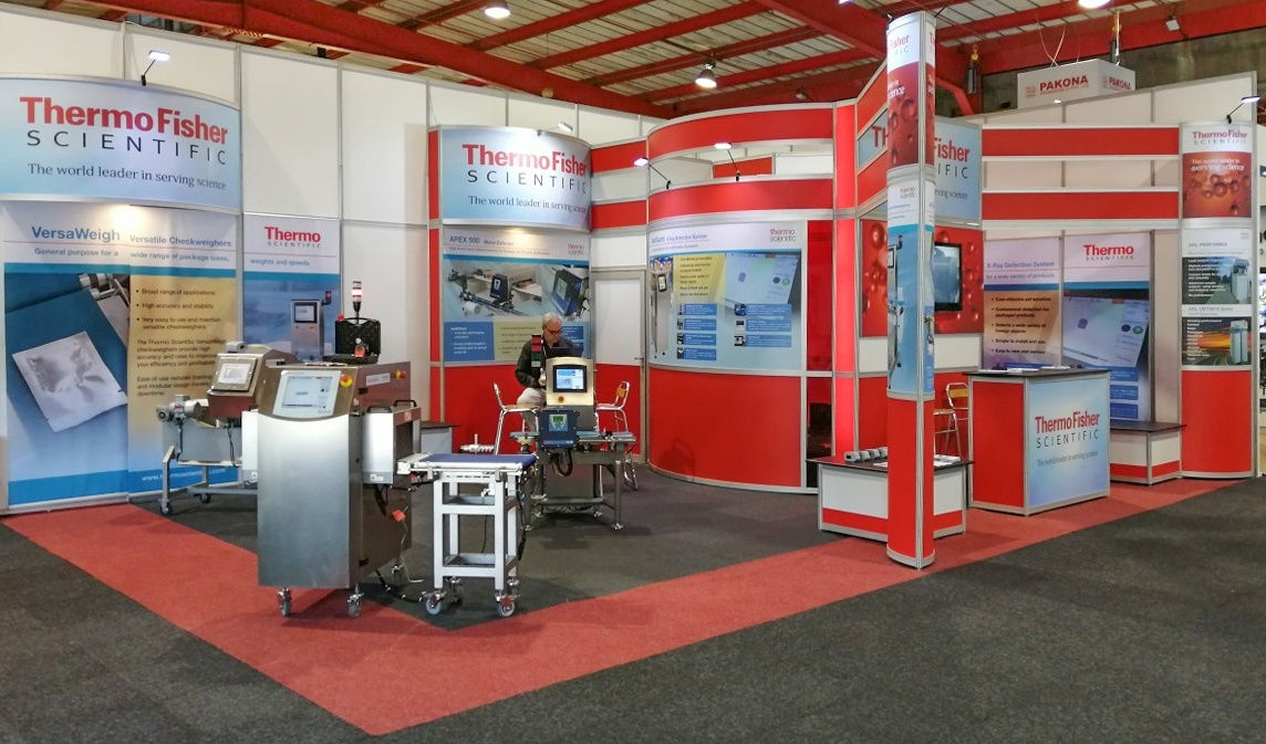 Thermo Fisher Scientific: system design exhibition stand. 48sqm with graphics on all walls,  built at NASREC. Front view.